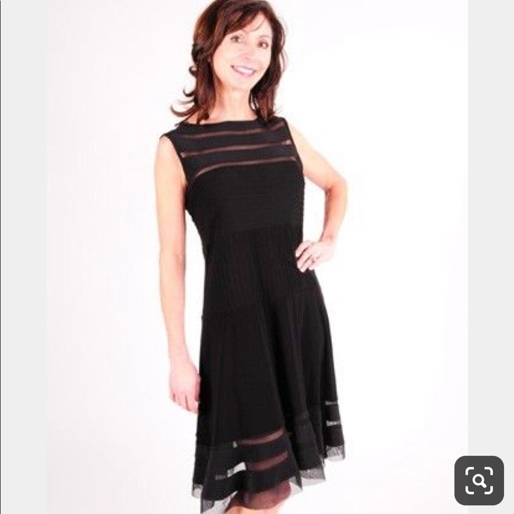 Black ribbed knit party dress with illusion panels